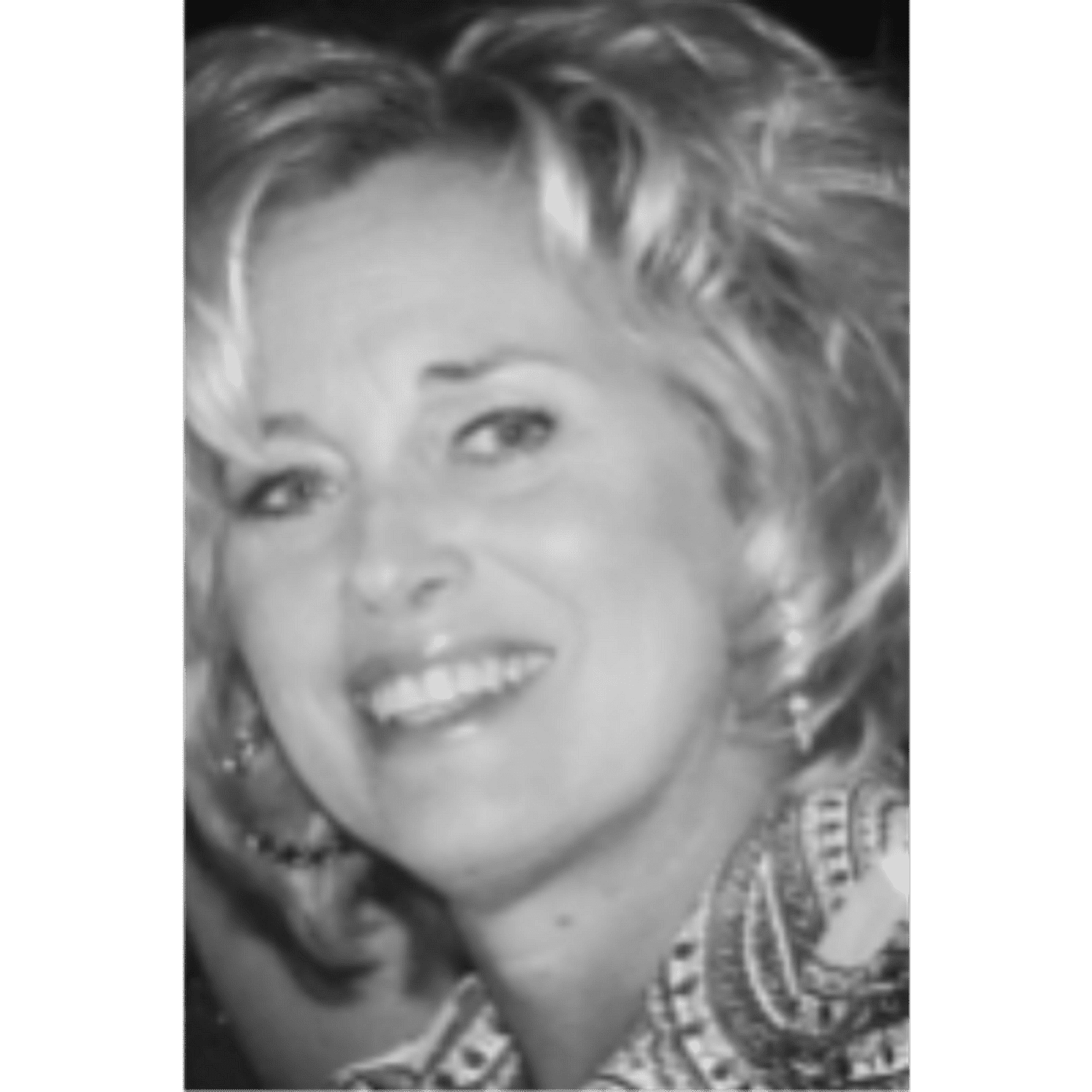 Portrait of Mary, a professional stylist at Laschi Hairstylists & Day Spa, showcasing their expertise and style.