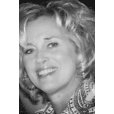 Portrait of Mary, a professional stylist at Laschi Hairstylists & Day Spa, showcasing their expertise and style.