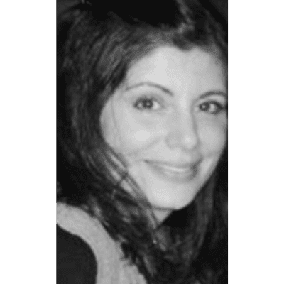 Portrait of Kristen, a professional stylist at Laschi Hairstylists & Day Spa, showcasing their expertise and style.
